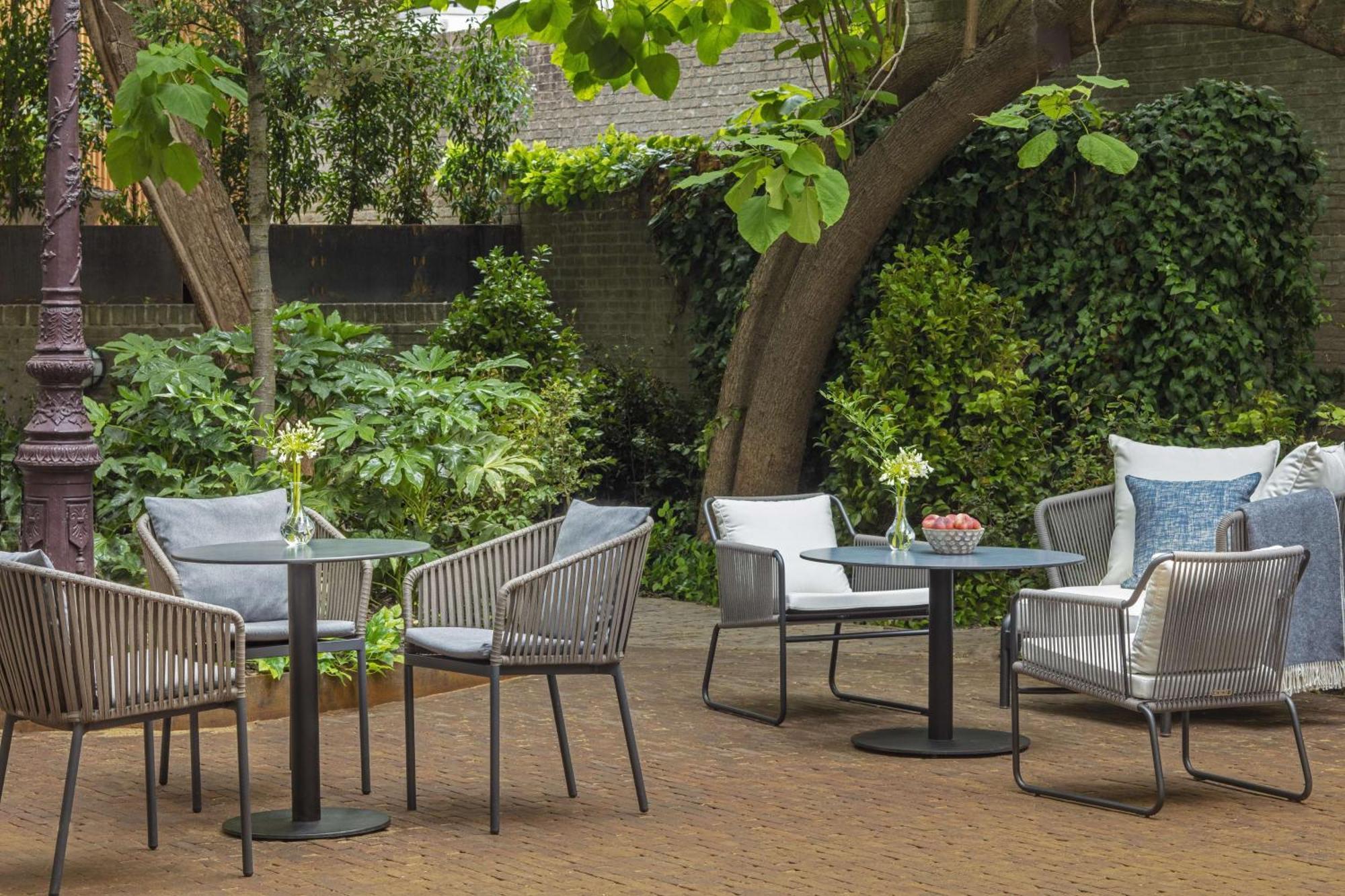 Anantara Grand Hotel Krasnapolsky Amsterdam Buitenkant foto The Garden at The Ivy Collection